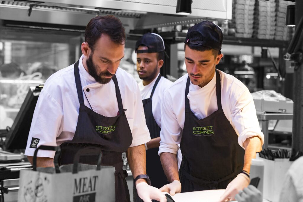 New Street Corner chef aprons in the kitchen.